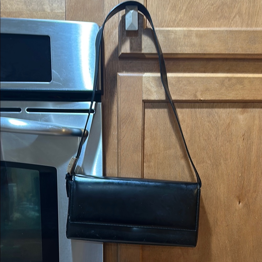 Vintage modern Salvatore Ferragamo Italian black leather shoulder flap handbag